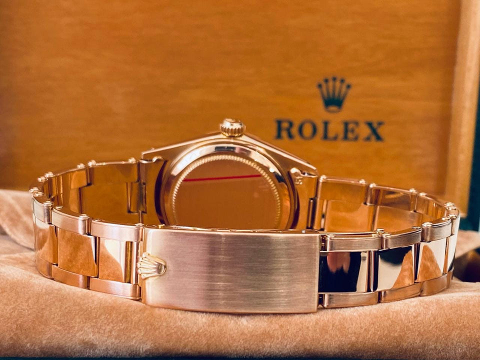 Rolex | Oyster Perpetual | 6627 | Rose gold | 31 mm | Rose gold | Silver | Automatic