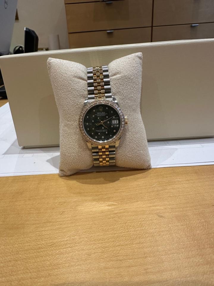Rolex Datejust Perpetual datejust Beautiful Diamond bezel and green petals with diamond face