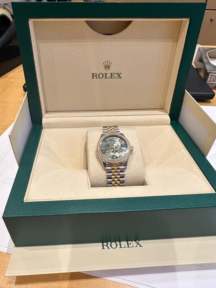 Rolex Datejust Perpetual datejust Beautiful Diamond bezel and green petals with diamond face