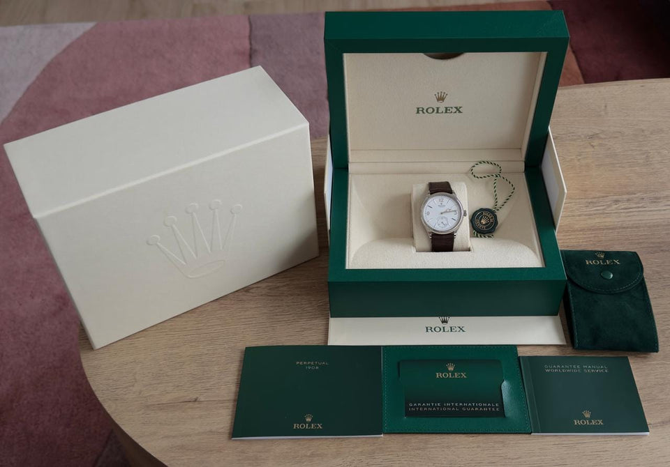 Rolex | 1908 | 52509 | White gold | 39 mm | Crocodile skin | White | Automatic