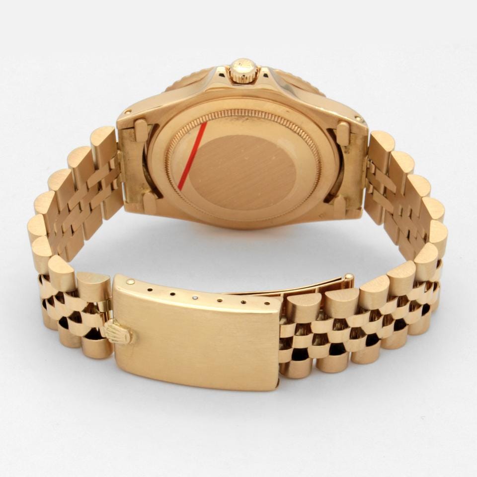 Rolex | GMT-Master | 1675 | Yellow gold | 40 mm | Steel | Brown | Automatic