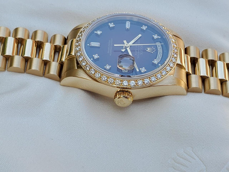 Rolex | Day-Date | 18038 | Yellow gold | 36 mm | Yellow gold | Red | Automatic