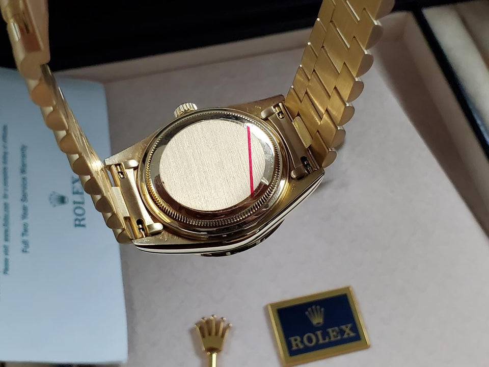 Rolex | Day-Date | 18038 | Yellow gold | 36 mm | Yellow gold | Red | Automatic