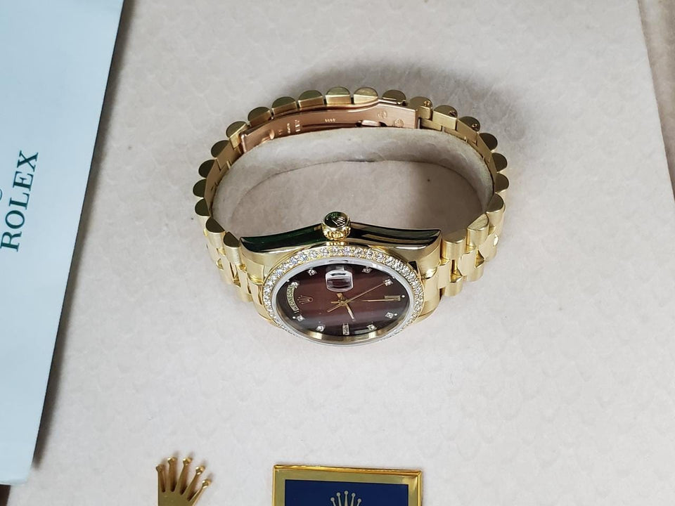 Rolex | Day-Date | 18038 | Yellow gold | 36 mm | Yellow gold | Red | Automatic