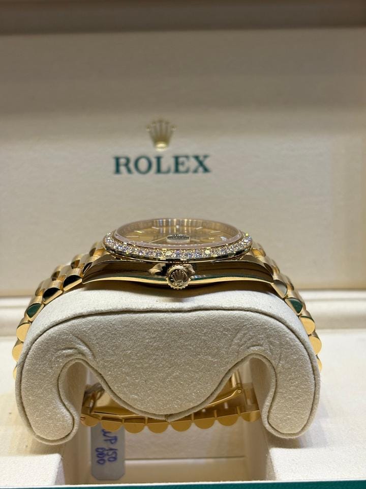 Rolex | Day-Date | 228348RBR | Yellow gold | 40 x 48 mm | Yellow gold | Champagne | Automatic