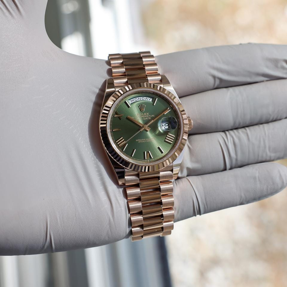 Rolex | Day-Date | 228235 | Rose gold | 40 x 47 mm | Rose gold | Green | Automatic