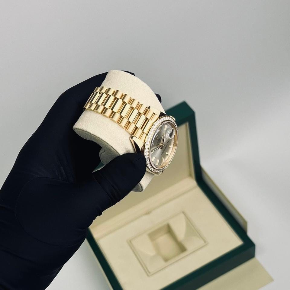Rolex | Day-Date | 228348RBR | Yellow gold | 40 x 48 mm | Yellow gold | White | Automatic