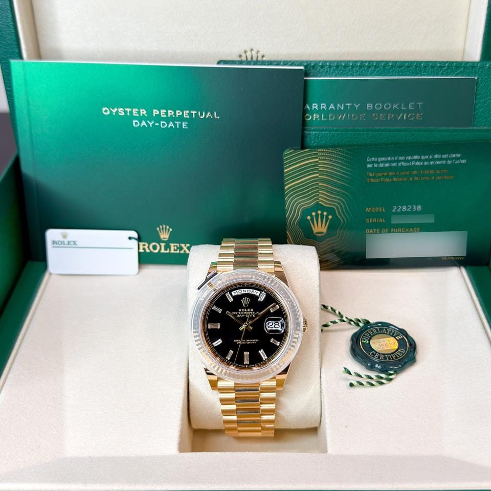 Rolex | Day-Date | 228238 | Yellow gold | 40 x 47 mm | Yellow gold | Black | Automatic