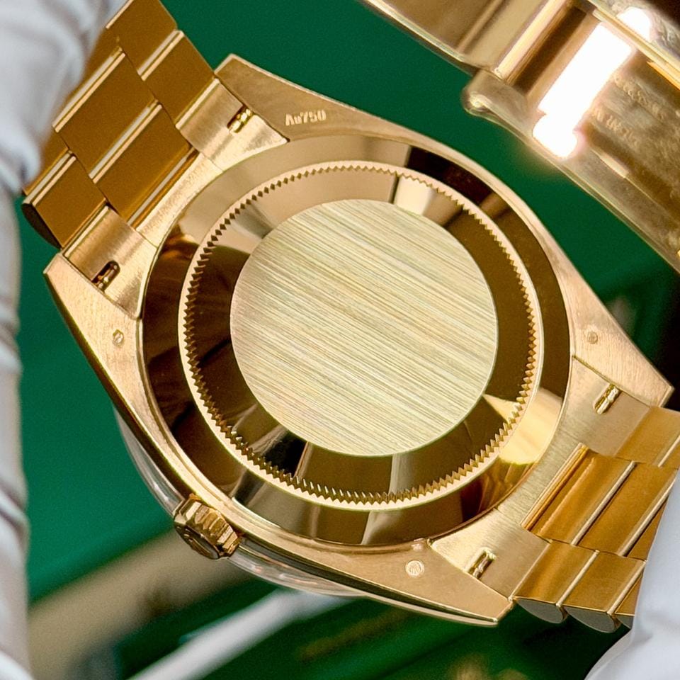 Rolex | Day-Date | 228238 | Yellow gold | 40 x 47 mm | Yellow gold | Black | Automatic