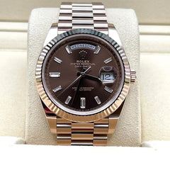 Rolex | Day-Date | 228235 | Rose gold | 42 mm | Rose gold | Brown | Automatic