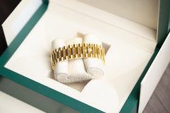 Rolex | Day-Date | 228398TBR | Yellow gold | 40 x 48 mm | Yellow gold | Green | Automatic