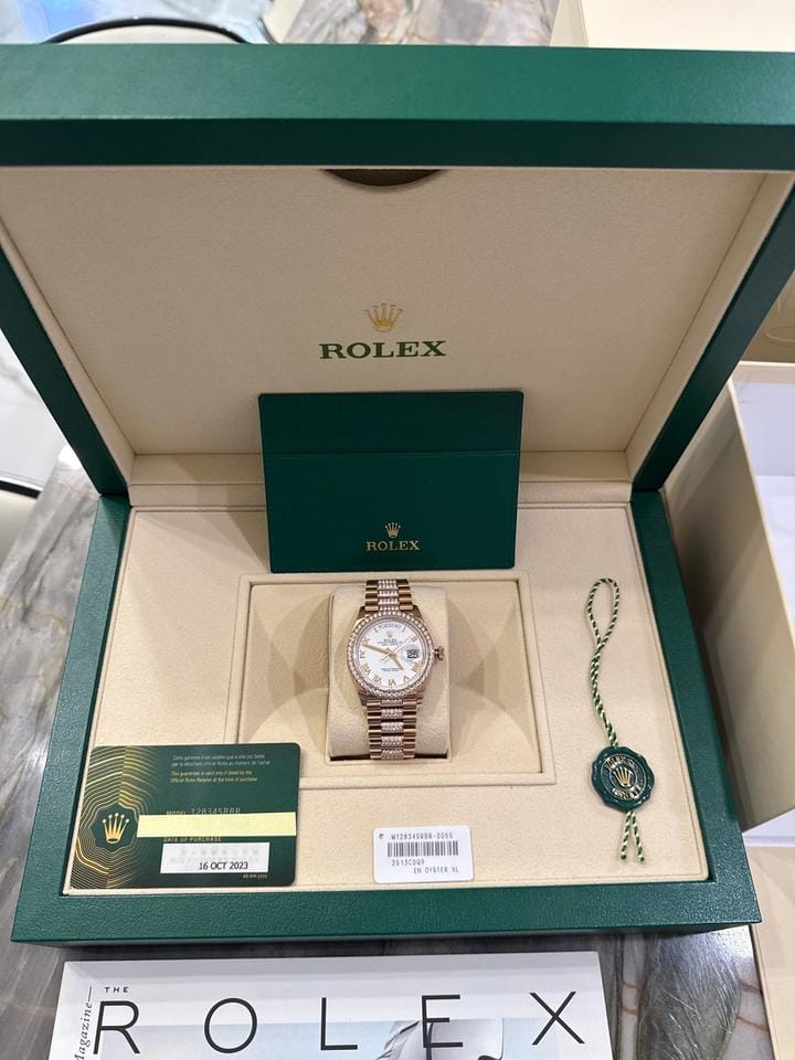 Rolex | Day-Date | 128345RBR | Rose gold | 36 x 43 mm | Rose gold | White | Automatic