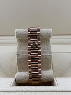 Rolex | Day-Date | 128235 | Rose gold | 36 x 43 mm | Rose gold | Orange | Automatic