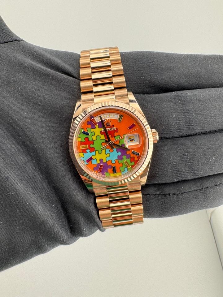 Rolex | Day-Date | 128235 | Rose gold | 36 x 43 mm | Rose gold | Orange | Automatic
