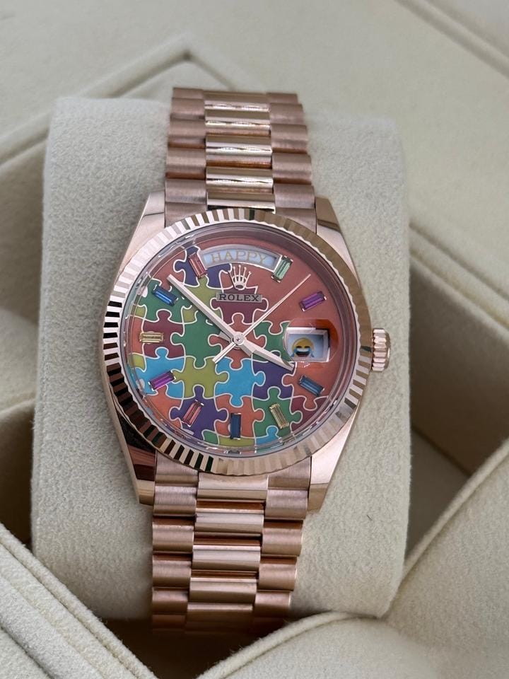 Rolex | Day-Date | 128235 | Rose gold | 36 x 43 mm | Rose gold | Orange | Automatic