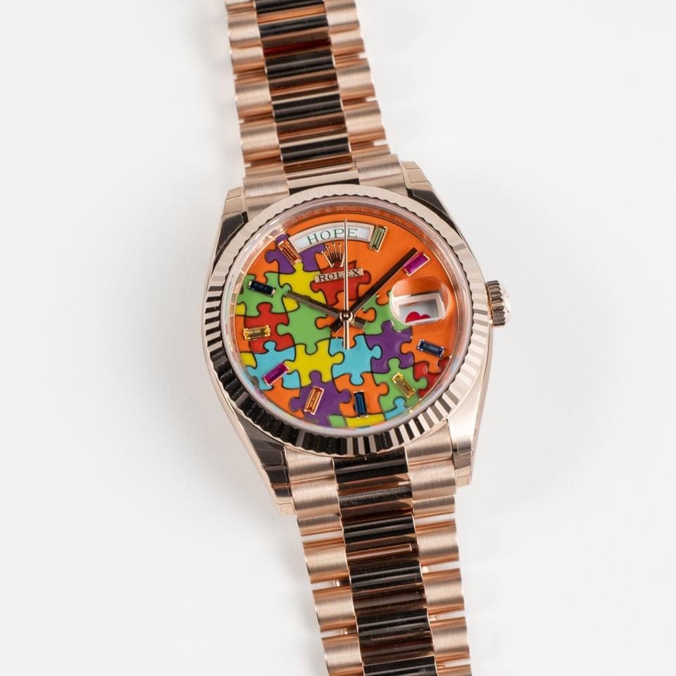 Rolex | Day-Date | 128235 | Rose gold | 36 mm | Rose gold | Orange | Automatic