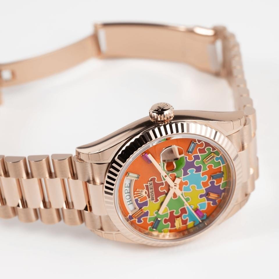 Rolex | Day-Date | 128235 | Rose gold | 36 mm | Rose gold | Orange | Automatic