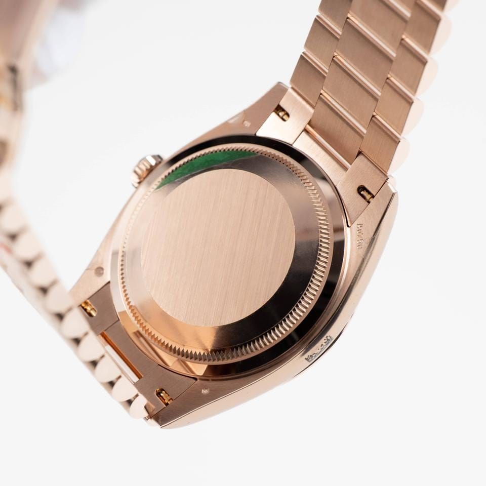 Rolex | Day-Date | 128235 | Rose gold | 36 mm | Rose gold | Orange | Automatic