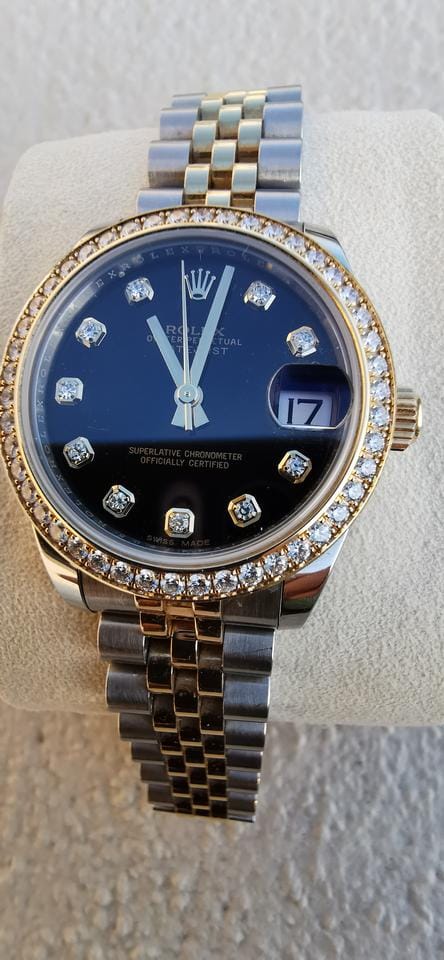 Rolex Oyster Perpetual 31 Cadran noir pierres précieuses Port et expertise offerts