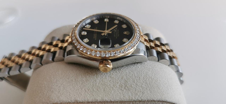 Rolex Oyster Perpetual 31 Cadran noir pierres précieuses Port et expertise offerts