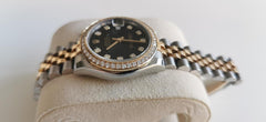 Rolex Oyster Perpetual 31 Cadran noir pierres précieuses Port et expertise offerts