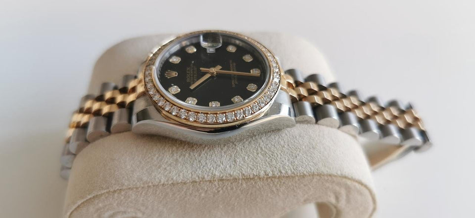 Rolex Oyster Perpetual 31 Cadran noir pierres précieuses Port et expertise offerts