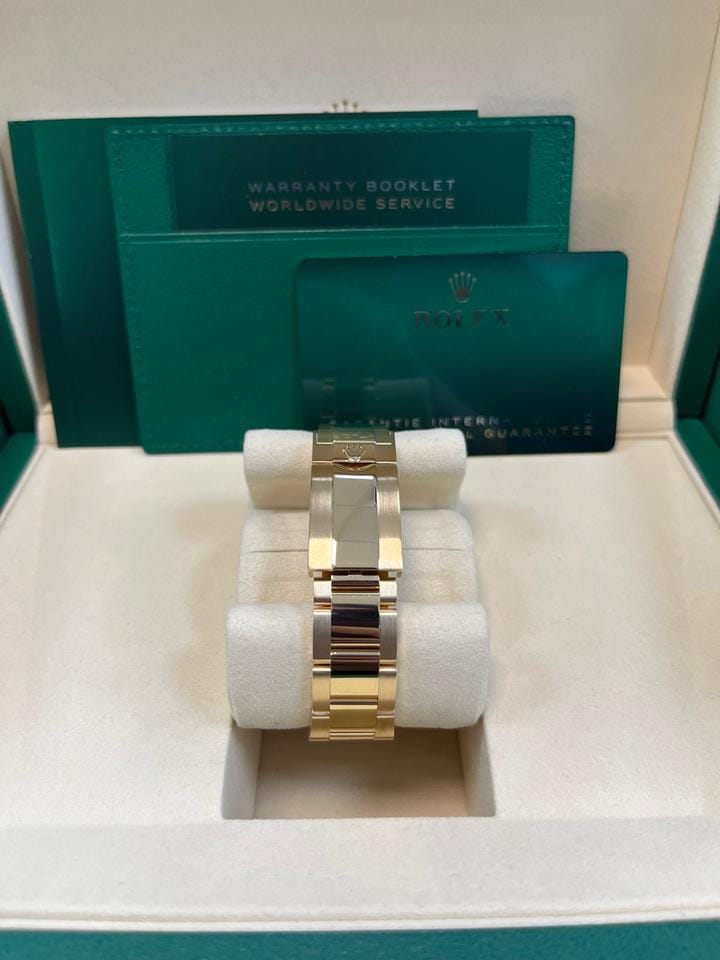 Rolex Yellow Gold Black And Champagne Index Dial Oyster Bracelet 126508