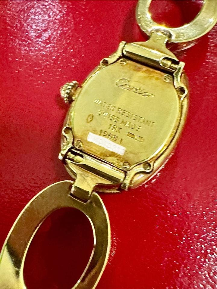 Cartier Baignoire REF.1967 AN ATTRACTIVE GOLD AND DIAMOND-SET BRACELET WATCH Rare