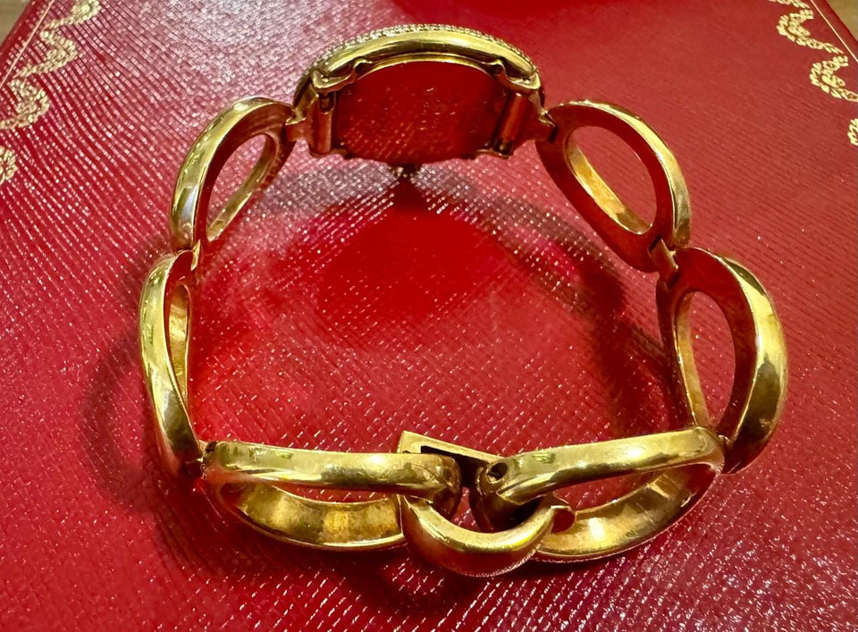 Cartier Baignoire REF.1967 AN ATTRACTIVE GOLD AND DIAMOND-SET BRACELET WATCH Rare