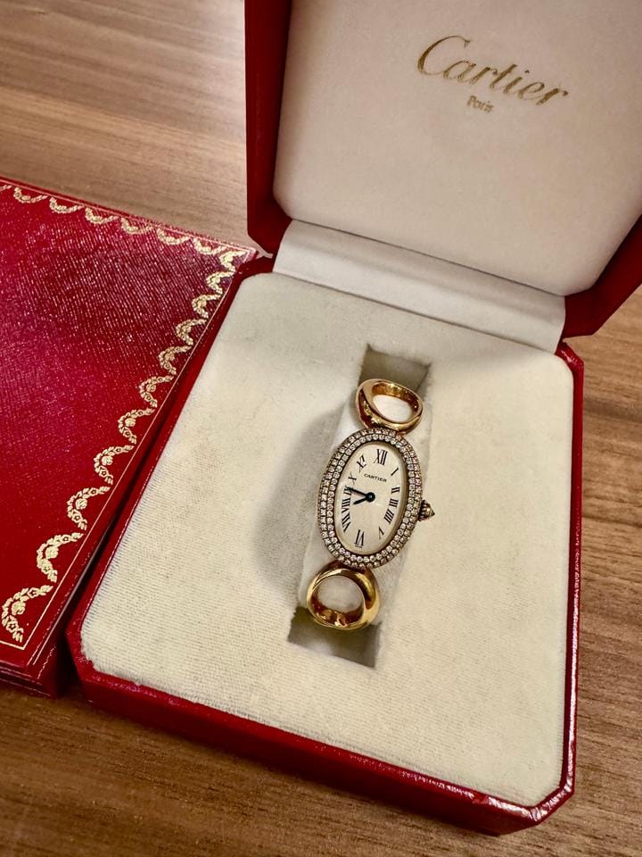 Cartier Baignoire REF.1967 AN ATTRACTIVE GOLD AND DIAMOND-SET BRACELET WATCH Rare