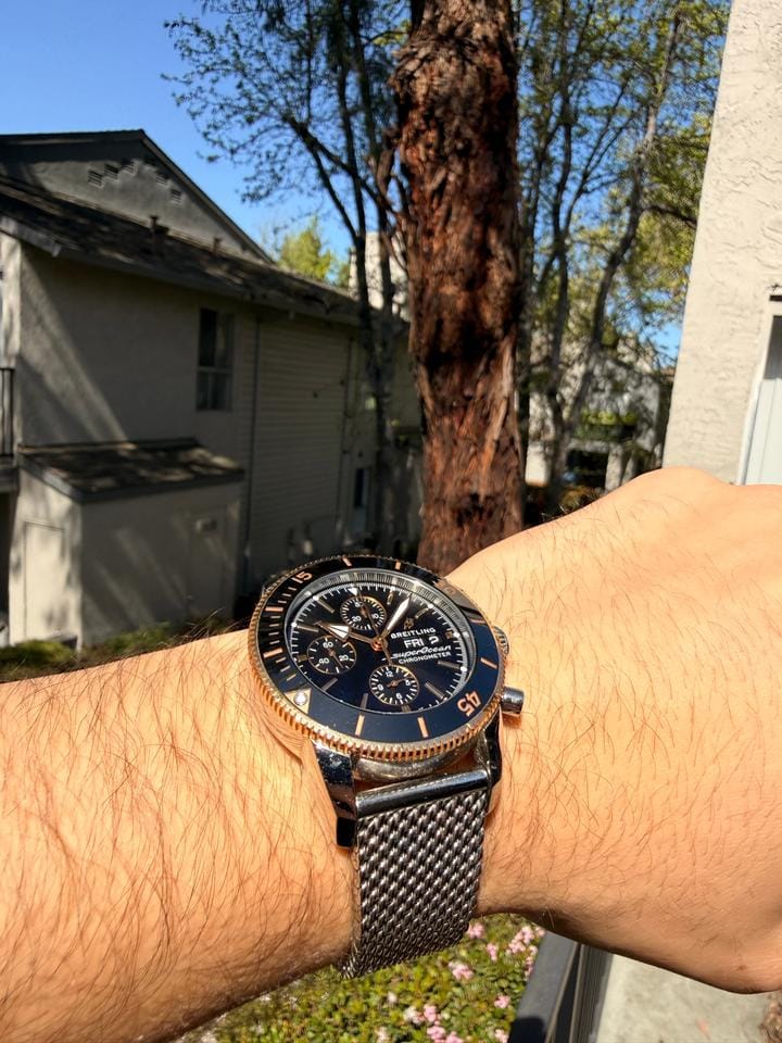 Breitling Superocean Heritage II Chronograph Features classic stainless steel mesh bracelet 18 K Rose Gold