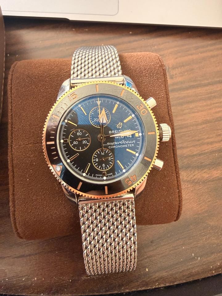 Breitling Superocean Heritage II Chronograph Features classic stainless steel mesh bracelet 18 K Rose Gold