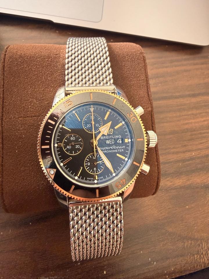 Breitling Superocean Heritage II Chronograph Features classic stainless steel mesh bracelet 18 K Rose Gold