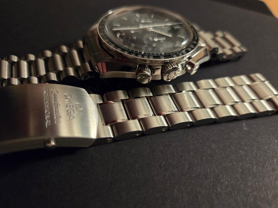 Omega Speedmaster Professional Moonwatchfull set extra bands unworn original bracelet