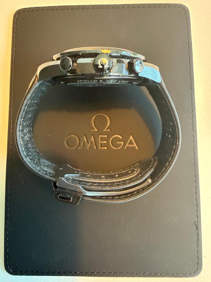 Omega Speedmaster Dark Side Of The Moon Apollo 8 Special Edition with both pin buckle & fold clasp.