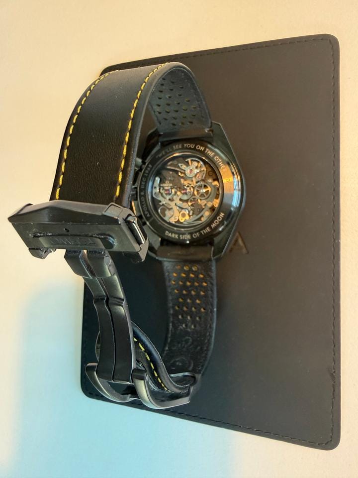 Omega Speedmaster Dark Side Of The Moon Apollo 8 Special Edition with both pin buckle & fold clasp.