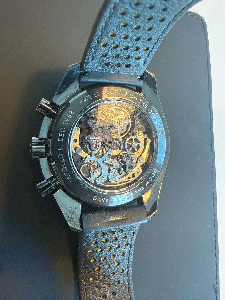 Omega Speedmaster Dark Side Of The Moon Apollo 8 Special Edition with both pin buckle & fold clasp.