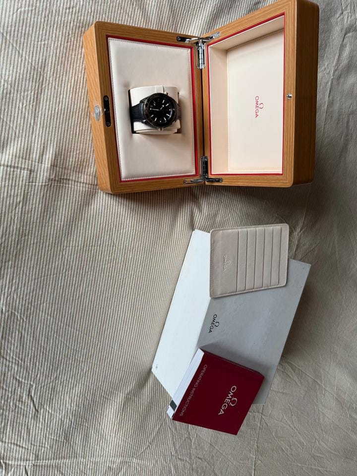 Omega Seamaster Planet Ocean Mint. Ceramic sedna gold. Collectors watch.