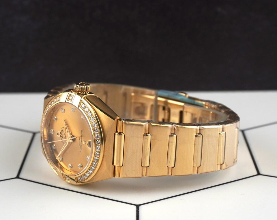 Omega Constellation29mm Constellation 18 K Yellow Gold Diamond Dial Watch 131.55.29.20.58.001