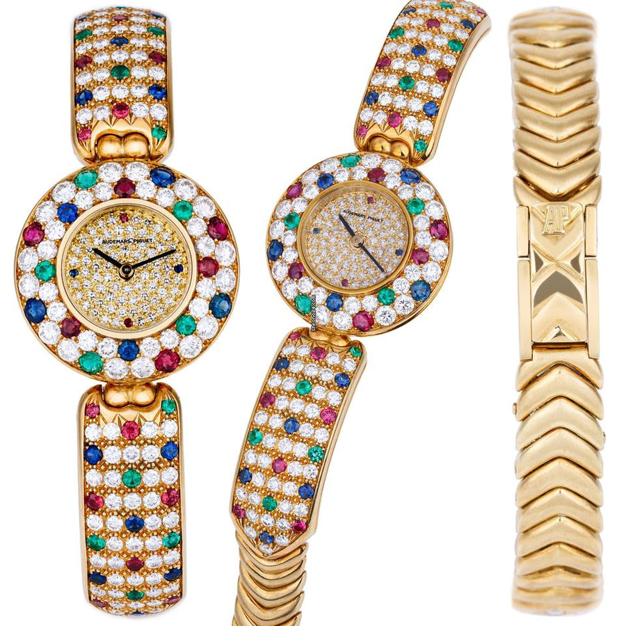 Audemars Piguet Unworn Extremely Rare Lady Wristwatch | Unique Pave Diamonds Emeralds Sapphires and Rubies | 18k Yellow Gold