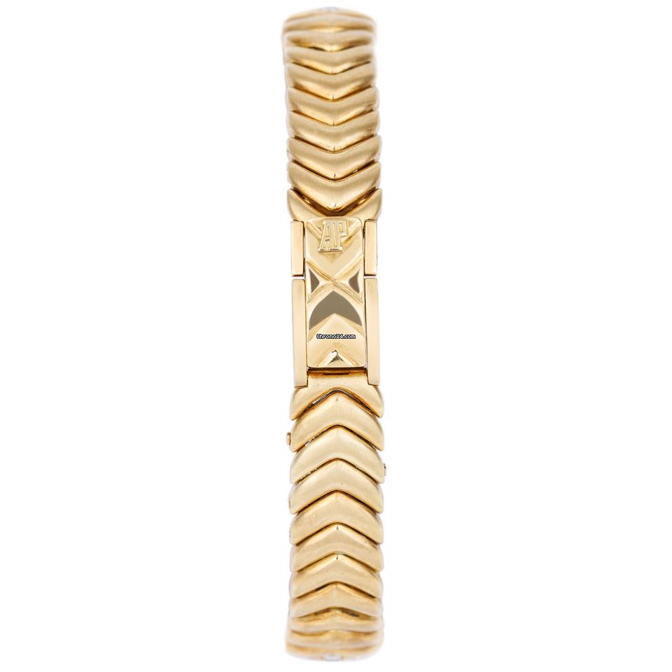 Audemars Piguet Unworn Extremely Rare Lady Wristwatch | Unique Pave Diamonds Emeralds Sapphires and Rubies | 18k Yellow Gold