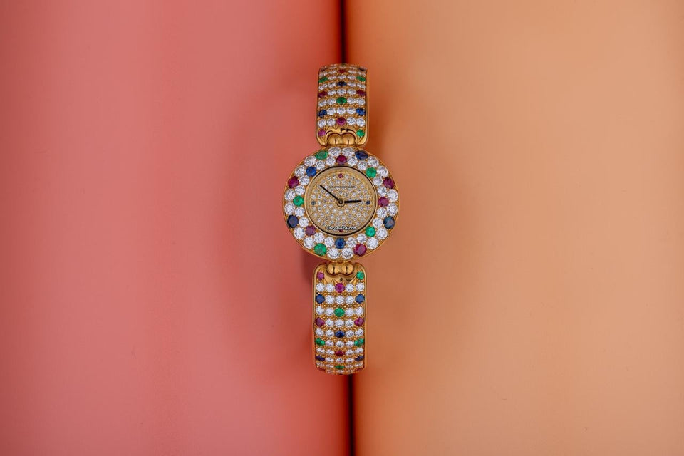 Audemars Piguet Unworn Extremely Rare Lady Wristwatch | Unique Pave Diamonds Emeralds Sapphires and Rubies | 18k Yellow Gold