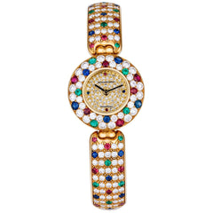 Audemars Piguet Unworn Extremely Rare Lady Wristwatch | Unique Pave Diamonds Emeralds Sapphires and Rubies | 18k Yellow Gold