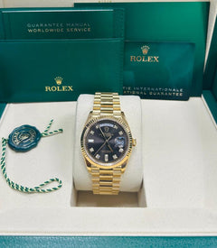Rolex | Day-Date | 128238 | Yellow gold | 36 x 43 mm | Yellow gold | Grey | Automatic
