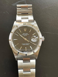 Rolex | Oyster Perpetual | 15210 | Steel | 34 mm | Steel | Black | Automatic