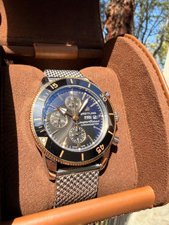 Breitling Superocean Heritage II Chronograph Features classic stainless steel mesh bracelet 18 K Rose Gold
