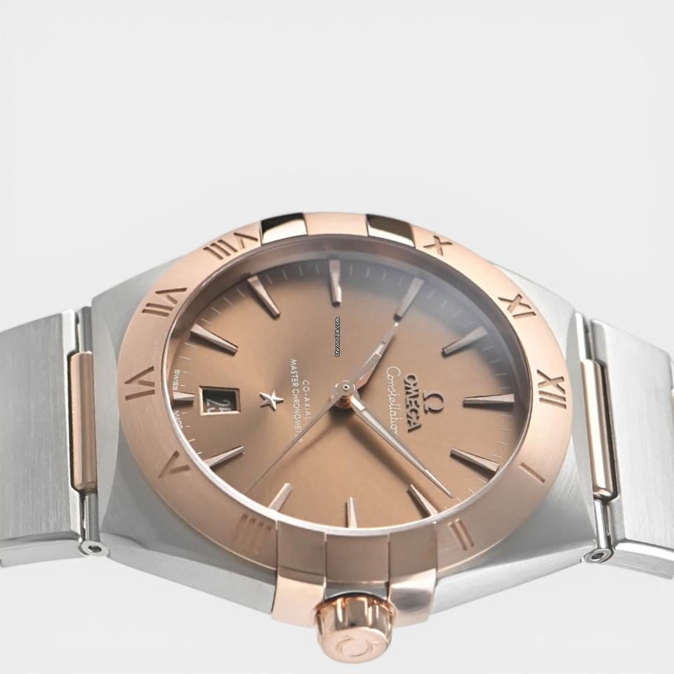 Omega Constellation Steel&Sedna gold / 39 mm / Box&Papers / 131.20.39.20.13.001