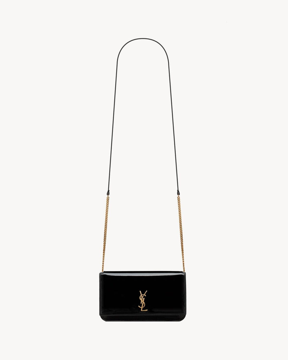 CASSANDRE phone holder IN PATENT LEATHER BLACK