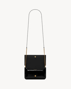 CASSANDRE phone holder IN PATENT LEATHER BLACK