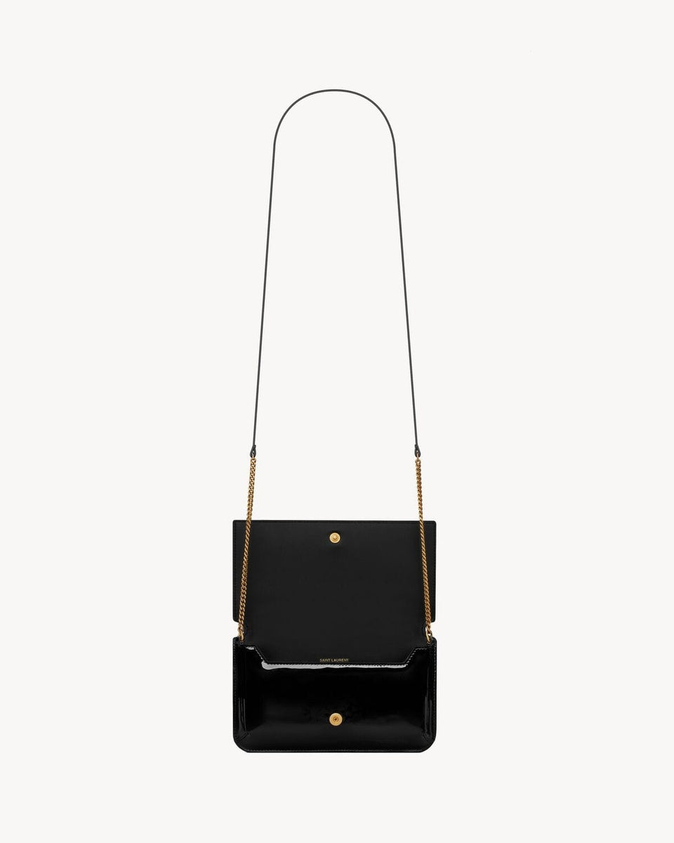 CASSANDRE phone holder IN PATENT LEATHER BLACK